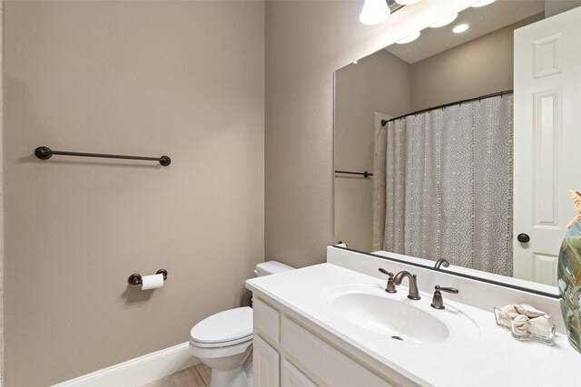 843 Bear Crossing Dr, Allen, TX 75013 - full bath featuring vanity, toilet, and baseboards
