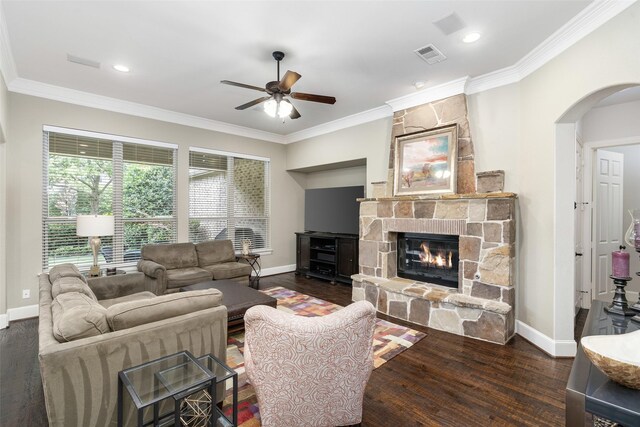 843 Bear Crossing Dr, Allen, TX 75013 - living area featuring a ceiling fan, arched walkways, baseboards, wood finished floors, and crown molding