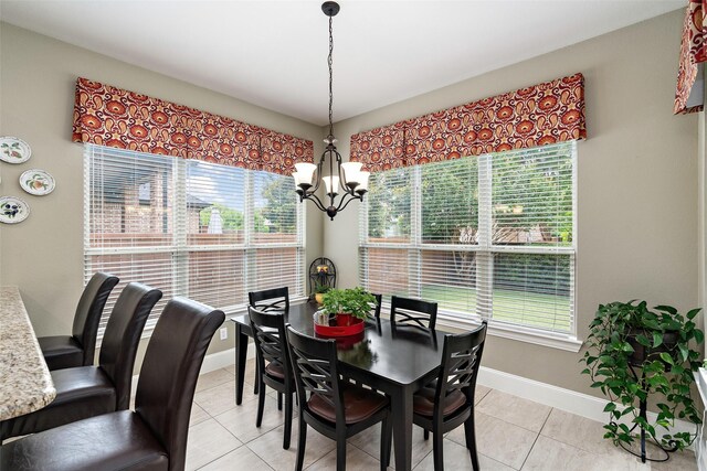 843 Bear Crossing Dr, Allen, TX 75013 - dining area with a chandelier, baseboards, plenty of natural light, and light tile patterned floors