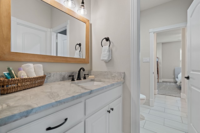 1803 Sunset Xing, Cedar Hill, TX 75104 - bathroom with toilet, vanity, baseboards, and tile patterned flooring