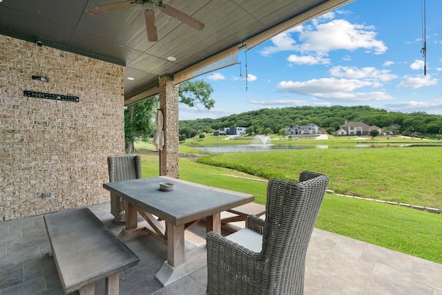 1803 Sunset Xing, Cedar Hill, TX 75104 - view of patio / terrace with a water view, outdoor dining area, and a ceiling fan
