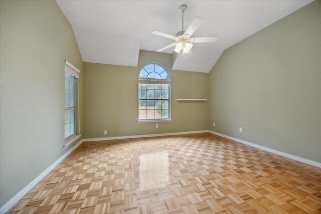 6404 Westgate Dr, North Richland Hills, TX 76182 - spare room with ceiling fan, lofted ceiling, and a textured ceiling