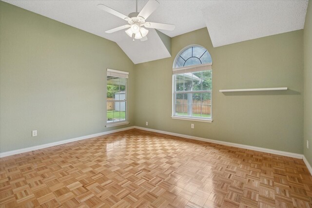 6404 Westgate Dr, North Richland Hills, TX 76182 - spare room featuring plenty of natural light, lofted ceiling, ceiling fan, and a textured ceiling