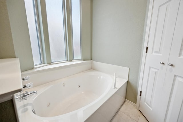6404 Westgate Dr, North Richland Hills, TX 76182 - full bathroom featuring a whirlpool tub and tile patterned floors