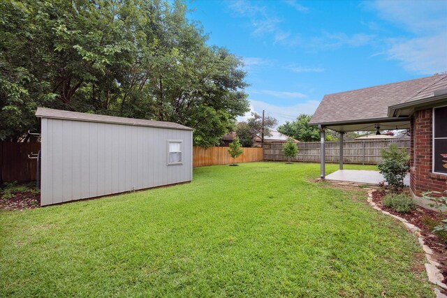 6404 Westgate Dr, North Richland Hills, TX 76182 - fenced backyard with a storage shed and a patio
