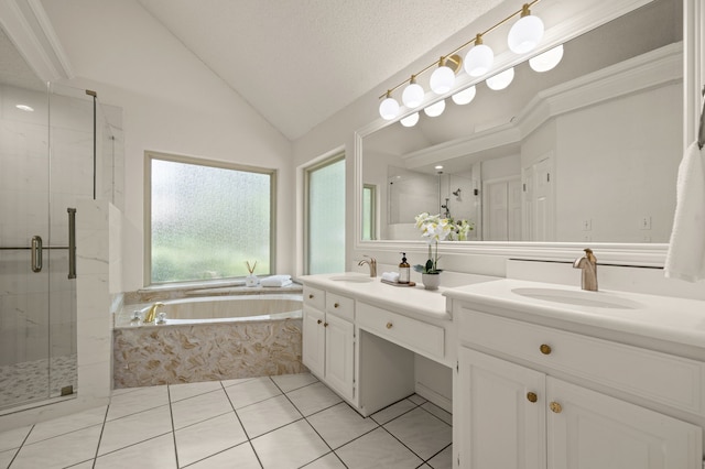 1535 Windsor Forest Trl, Keller, TX 76262 - bathroom featuring double vanity, a garden tub, a stall shower, tile patterned flooring, and vaulted ceiling