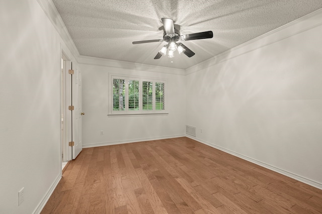 1535 Windsor Forest Trl, Keller, TX 76262 - empty room with ceiling fan, a textured ceiling, light wood-style flooring, and crown molding