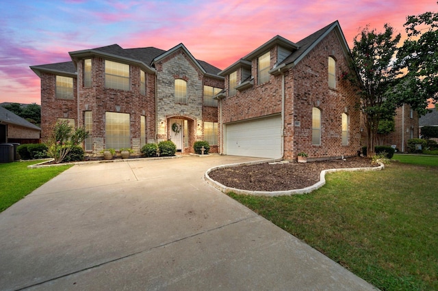 606 Eagle Ct, Keller, TX 76248 - view of front of home featuring a garage, concrete driveway, a front lawn, brick siding, and cooling unit