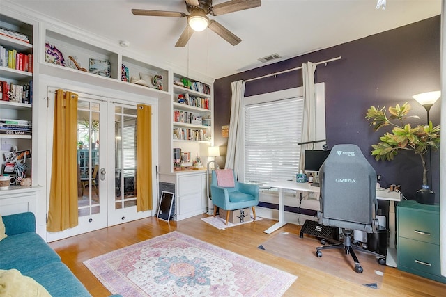 2108 Fairmount Ave, Fort Worth, TX 76110 - office area with ceiling fan, french doors, and wood finished floors