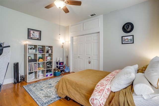 2108 Fairmount Ave, Fort Worth, TX 76110 - bedroom featuring wood finished floors and a ceiling fan