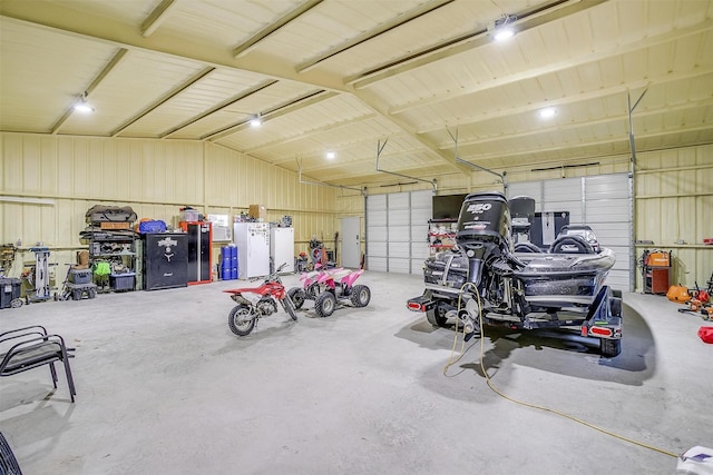 1107 Perkins Rd, Poolville, TX 76487 - garage featuring metal wall