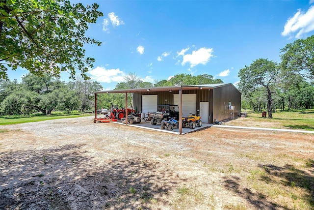1107 Perkins Rd, Poolville, TX 76487 - view of outdoor structure with dirt driveway