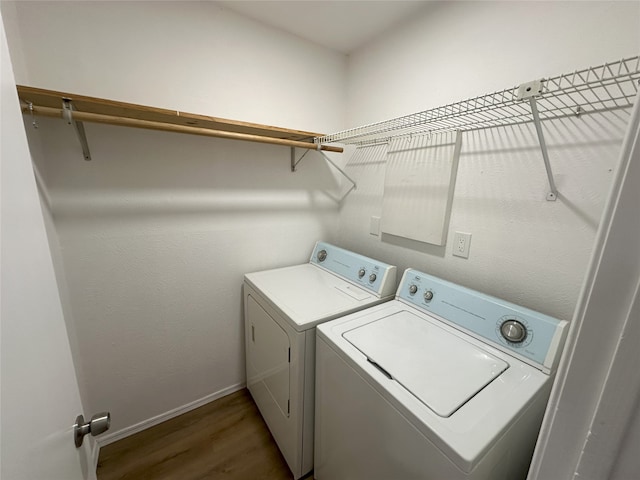 1616 Urbana Cir, Plano, TX 75025 - washroom featuring washing machine and dryer, dark wood-style flooring, and baseboards