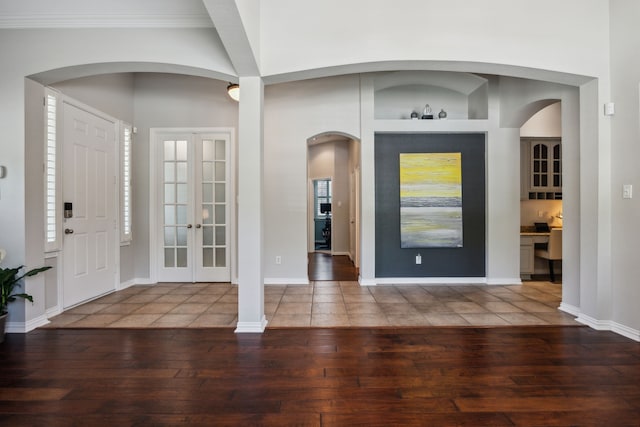 2707 Barnhill Ln, Frisco, TX 75034 - entryway featuring hardwood / wood-style flooring, french doors, and arched walkways