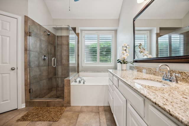 2707 Barnhill Ln, Frisco, TX 75034 - full bath with vanity, a garden tub, a stall shower, and a ceiling fan