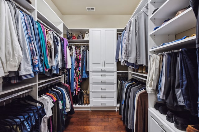 2707 Barnhill Ln, Frisco, TX 75034 - walk in closet featuring dark wood-style flooring