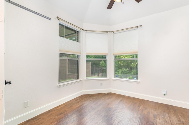1416 Tangle Ridge Dr, Mckinney, TX 75071 - unfurnished room with ceiling fan, baseboards, wood finished floors, and plenty of natural light