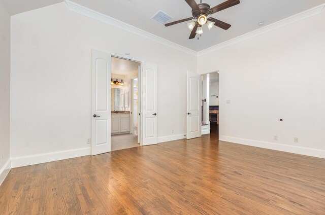 1416 Tangle Ridge Dr, Mckinney, TX 75071 - empty room with ornamental molding, a ceiling fan, baseboards, and wood finished floors