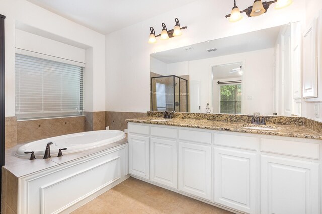 1416 Tangle Ridge Dr, Mckinney, TX 75071 - full bathroom with a stall shower, double vanity, a bath, and tile patterned floors