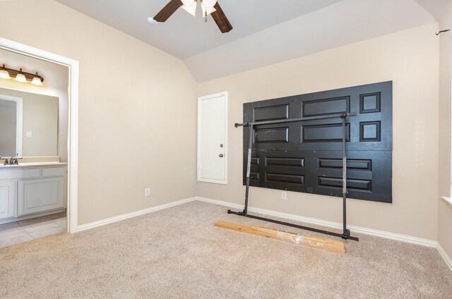 1416 Tangle Ridge Dr, Mckinney, TX 75071 - unfurnished bedroom with carpet floors, vaulted ceiling, a sink, baseboards, and ensuite bath