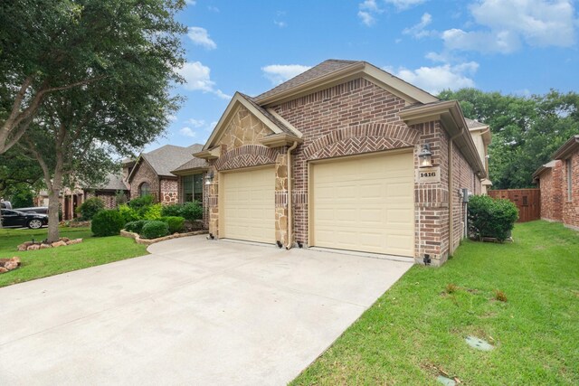 1416 Tangle Ridge Dr, Mckinney, TX 75071 - view of front facade featuring an attached garage, concrete driveway, and a front yard