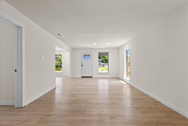 2634 Macon St, Dallas, TX 75215 - foyer entrance with light wood-style floors and recessed lighting