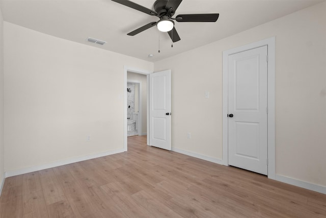 2634 Macon St, Dallas, TX 75215 - unfurnished bedroom featuring light wood-style flooring and ceiling fan