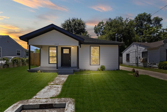 2634 Macon St, Dallas, TX 75215 - view of front of home featuring a porch and a yard