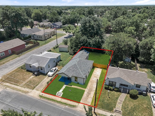 2634 Macon St, Dallas, TX 75215 - aerial perspective of suburban area featuring property parcel outlined and a heavily wooded area
