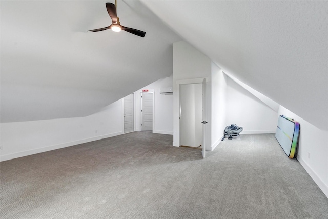 2418 Spirit Ct, Tolar, TX 76476 - additional living space featuring carpet, vaulted ceiling, ceiling fan, a wall mounted AC, and baseboards