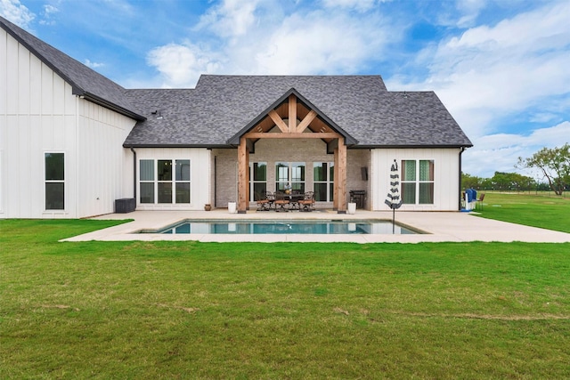 2418 Spirit Ct, Tolar, TX 76476 - back of house featuring an outdoor pool, a patio, a yard, a shingled roof, and board and batten siding