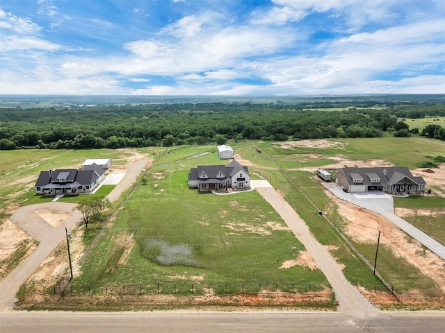 2418 Spirit Ct, Tolar, TX 76476 - view from above of property with a heavily wooded area