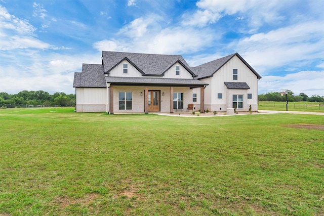 2418 Spirit Ct, Tolar, TX 76476 - modern inspired farmhouse featuring a front yard, board and batten siding, and roof with shingles