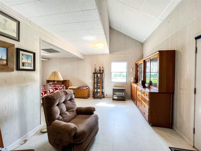 5260 County Road 268, Anson, TX 79501 - living area featuring wood walls and light floors
