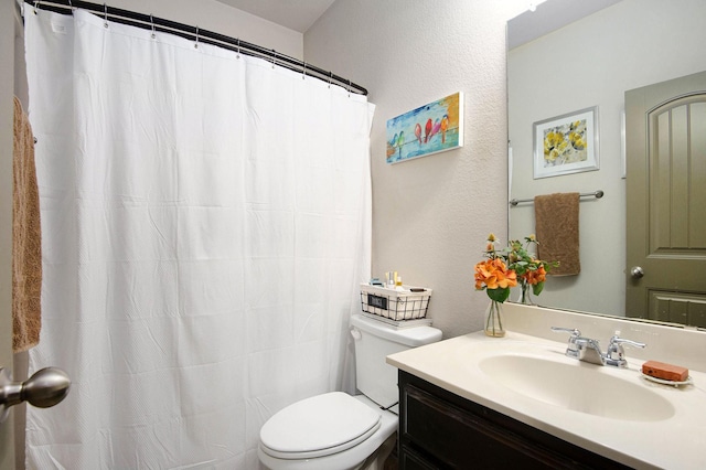 407 Dill Rd, Weatherford, TX 76085 - bathroom with vanity, a textured wall, and curtained shower