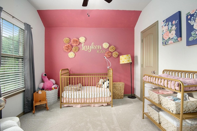 407 Dill Rd, Weatherford, TX 76085 - carpeted bedroom with vaulted ceiling, a crib, and ceiling fan