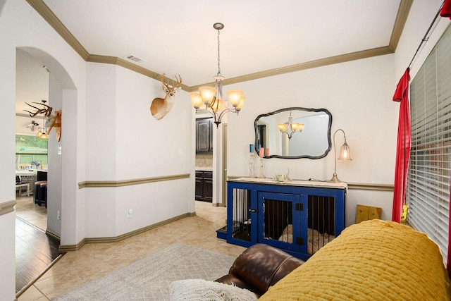 407 Dill Rd, Weatherford, TX 76085 - living room featuring a chandelier, arched walkways, and crown molding