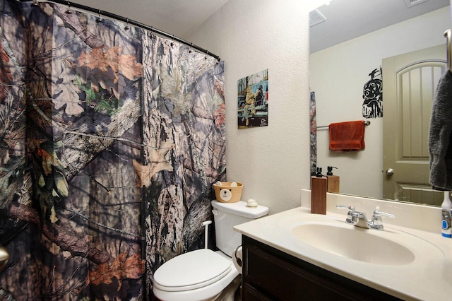 407 Dill Rd, Weatherford, TX 76085 - bathroom with vanity, a textured wall, and a shower with shower curtain
