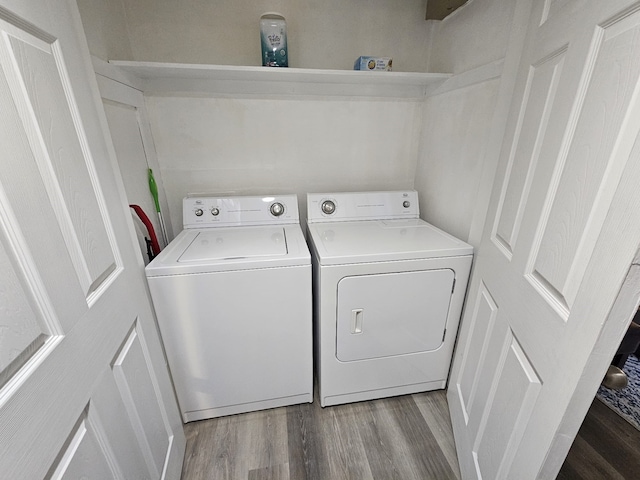 5913 Lake Hubbard Pkwy Unit 124, Garland, TX 75043 - laundry area with washer and dryer and wood finished floors
