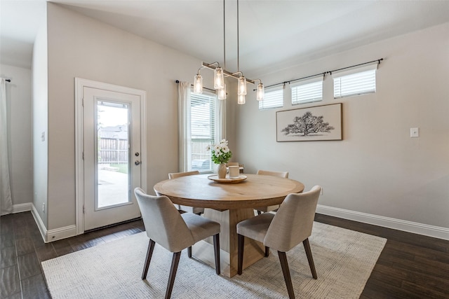 2921 Crossbow Ln, Celina, TX 75009 - dining room with baseboards and dark wood-style floors