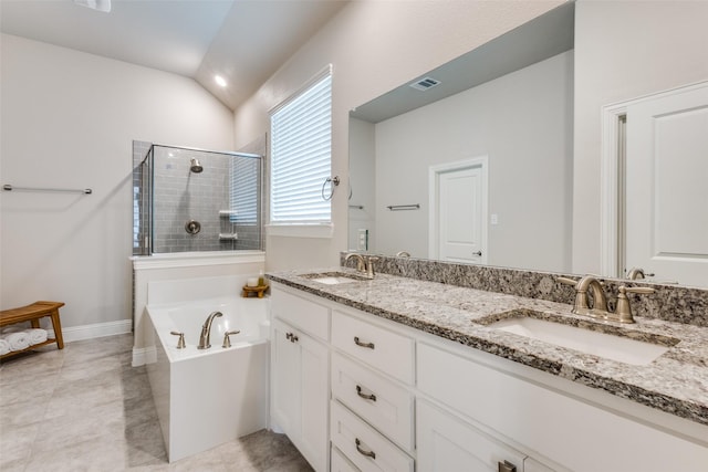 2921 Crossbow Ln, Celina, TX 75009 - full bath featuring double vanity, a stall shower, a garden tub, lofted ceiling, and tile patterned floors