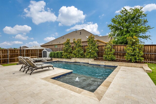 2921 Crossbow Ln, Celina, TX 75009 - view of swimming pool featuring a patio area and a fenced backyard
