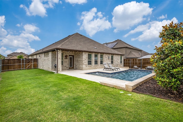 2921 Crossbow Ln, Celina, TX 75009 - rear view of house with brick siding, a patio area, and roof with shingles