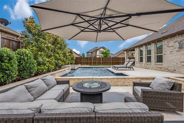 2921 Crossbow Ln, Celina, TX 75009 - fenced backyard with an outdoor living space with a fire pit and a patio