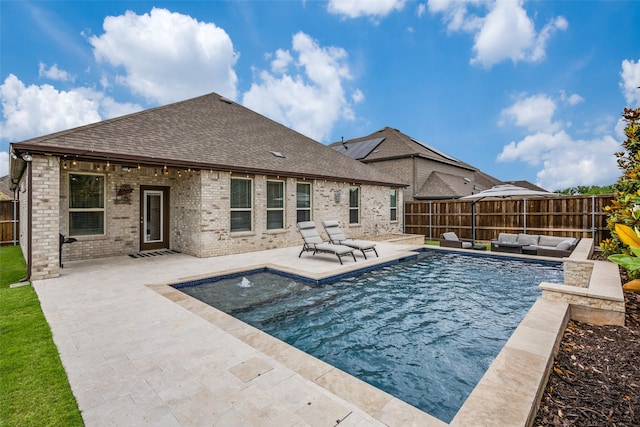 2921 Crossbow Ln, Celina, TX 75009 - view of swimming pool with an outdoor living space, a patio, and a fenced backyard