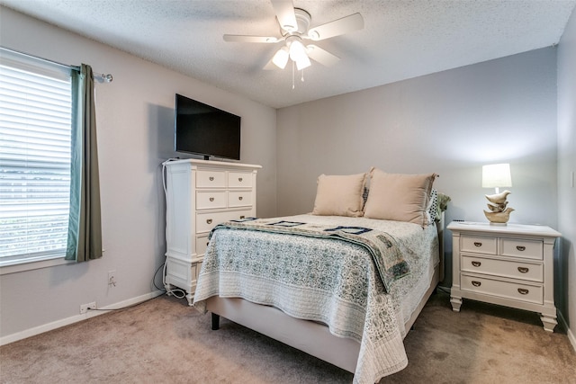 649 Timberline Dr, Hurst, TX 76053 - bedroom with carpet flooring, a ceiling fan, baseboards, and a textured ceiling