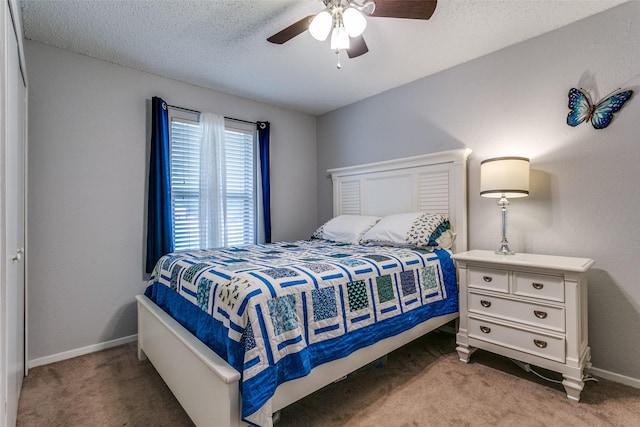 649 Timberline Dr, Hurst, TX 76053 - carpeted bedroom featuring baseboards and ceiling fan