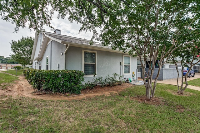 649 Timberline Dr, Hurst, TX 76053 - view of front facade with stucco siding and a chimney