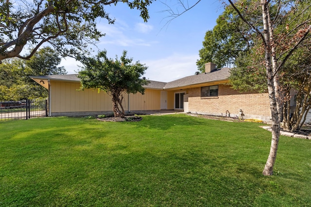 208 Ashe Bend Dr, Rowlett, TX 75087 - view of front of house with a chimney and brick siding