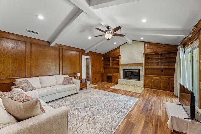 208 Ashe Bend Dr, Rowlett, TX 75087 - living room featuring a ceiling fan, light wood-style floors, a fireplace, and recessed lighting